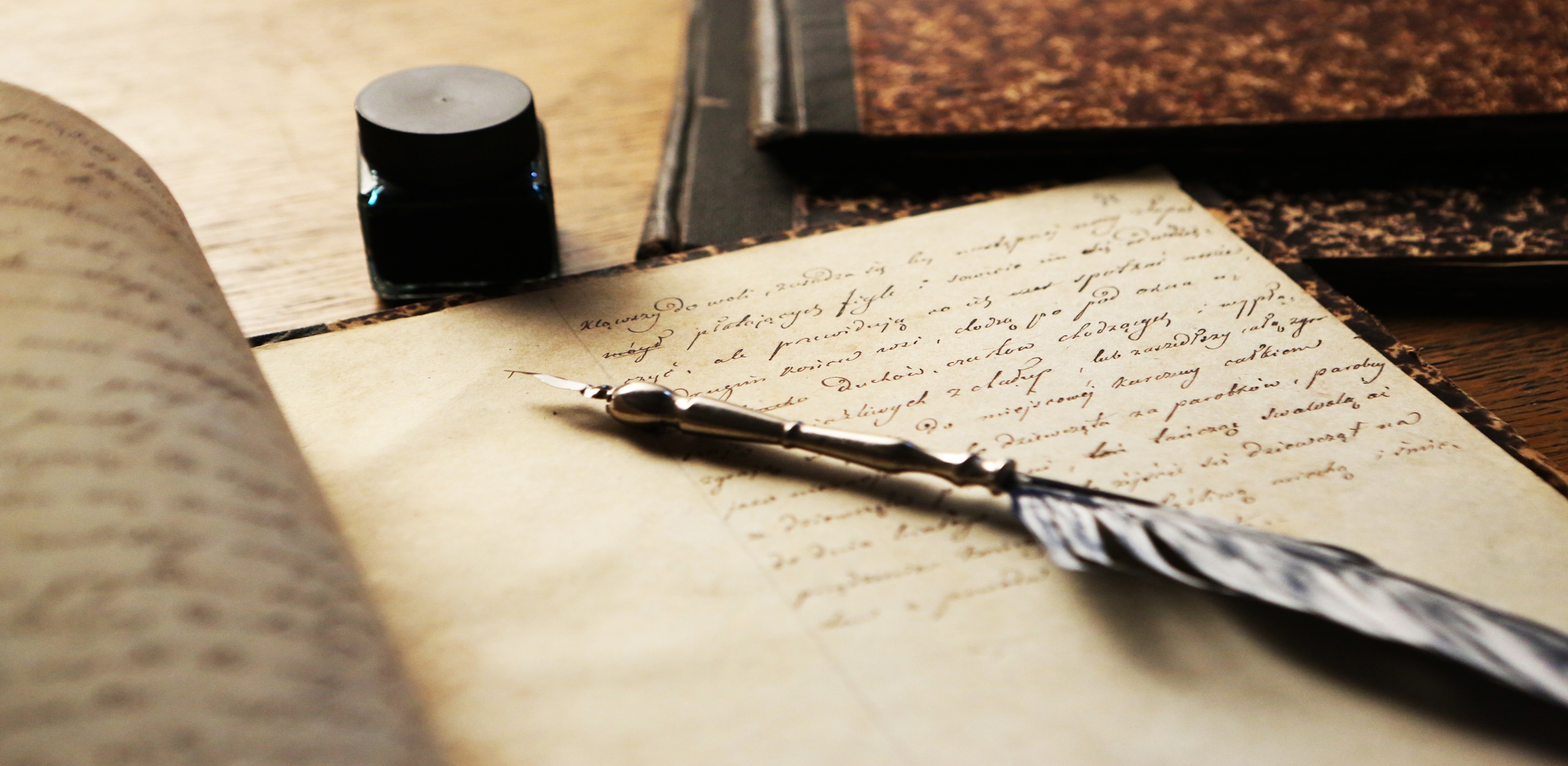 A notebook and pen symbolizing the creative process of writing poetry.